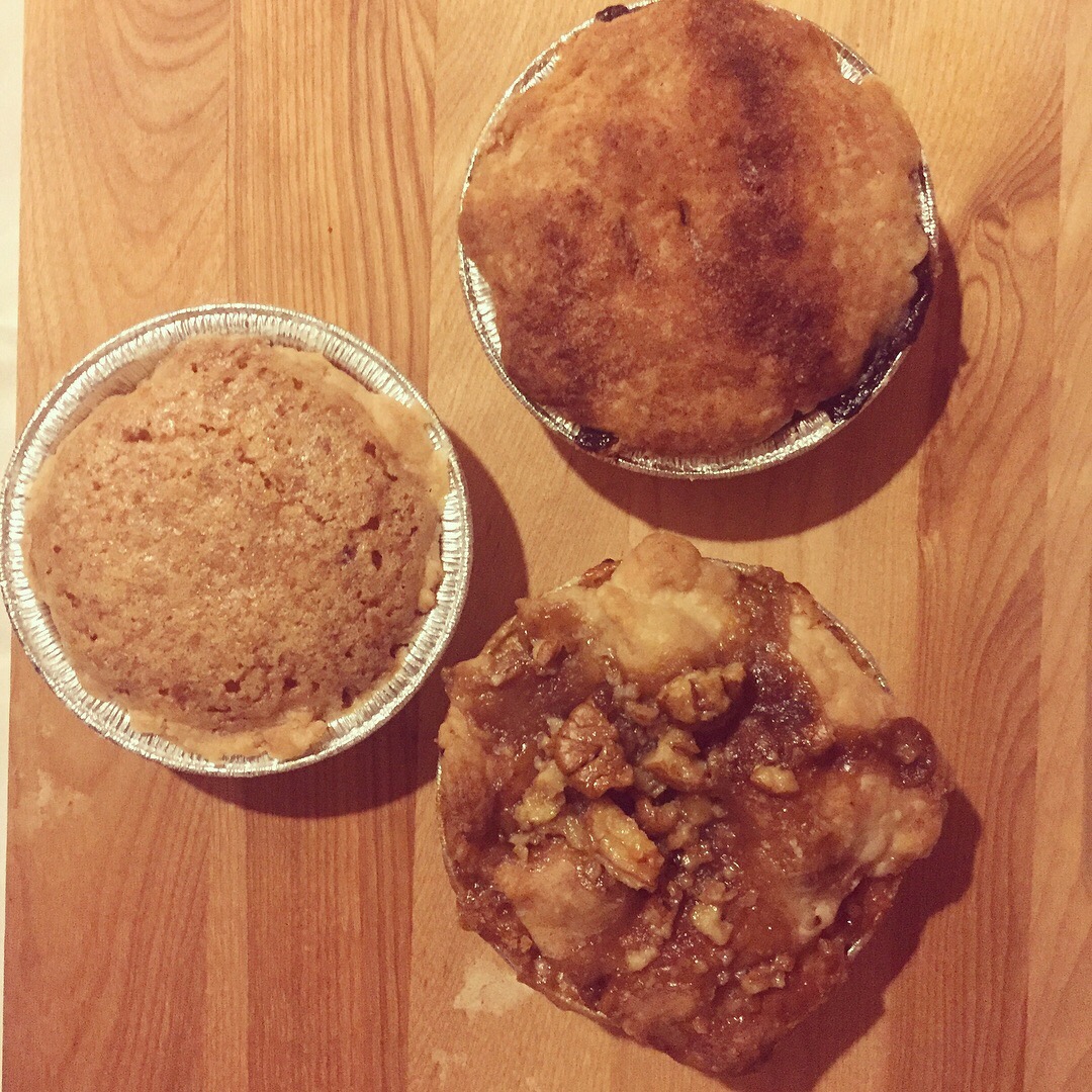 From left, going clockwise coconut, blueberry, and apple pies.